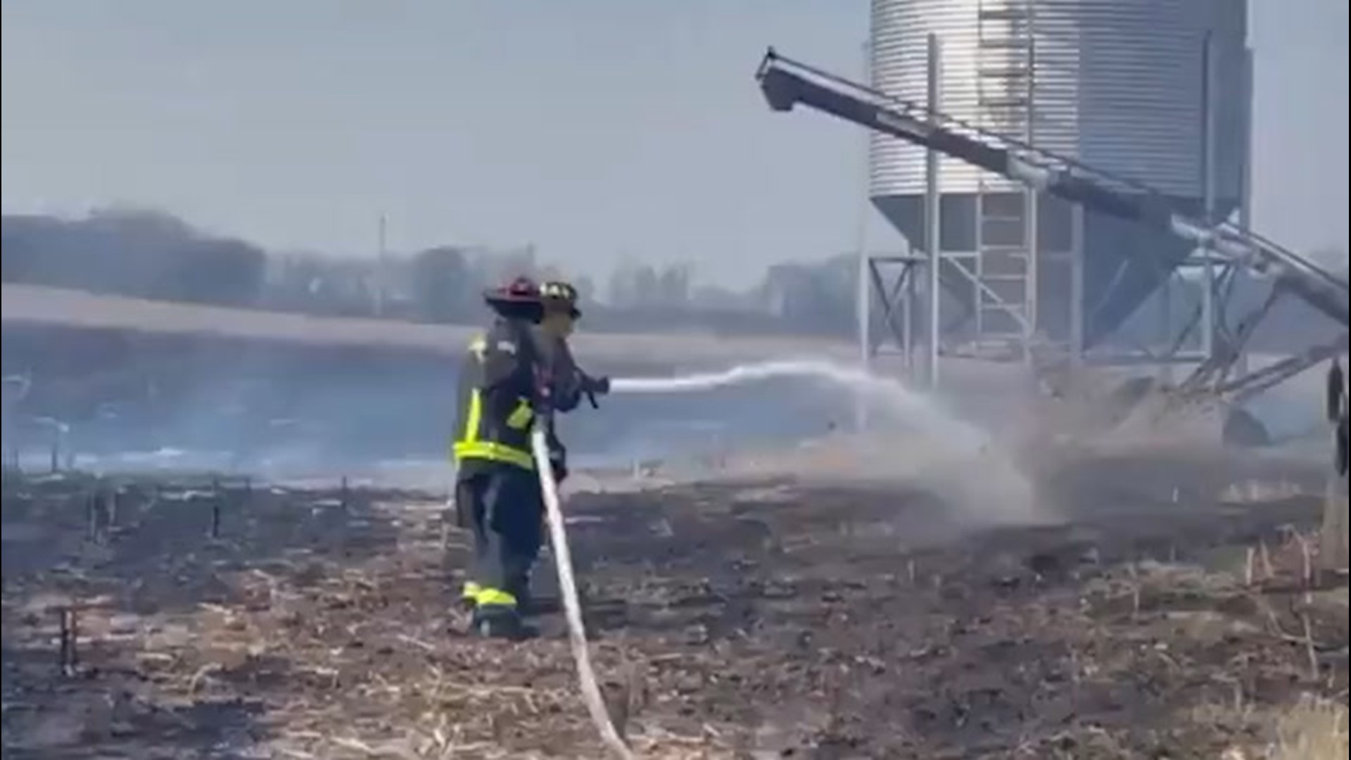 The Bargersville Fire and Whiteland Fire departments teamed up to battle a grass fire burning under low humid and windy conditions on March 8 in Indiana.