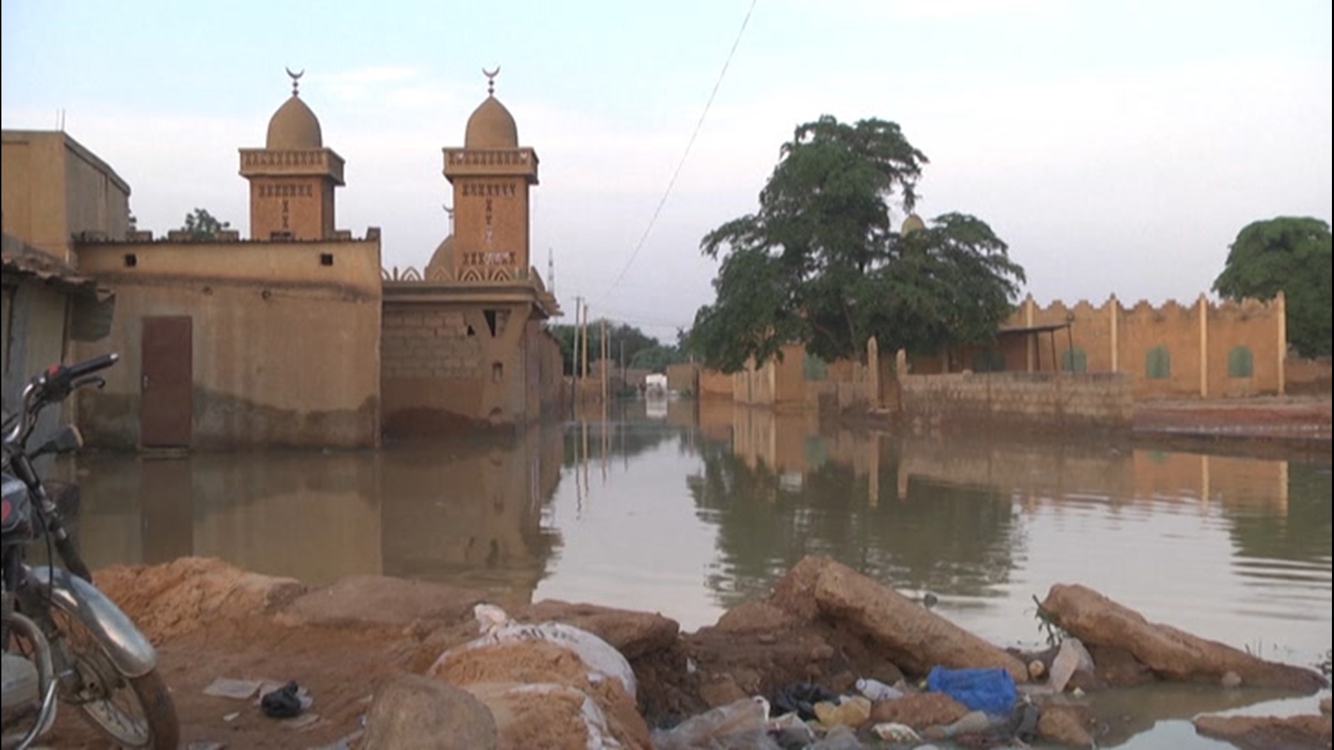 Several months of heavy rain have triggered flooding in Niger, killing more than 60 people. In the capital city of Niamey, water still inundated the streets on Sept. 9, with some seen using canoes to navigate the area.