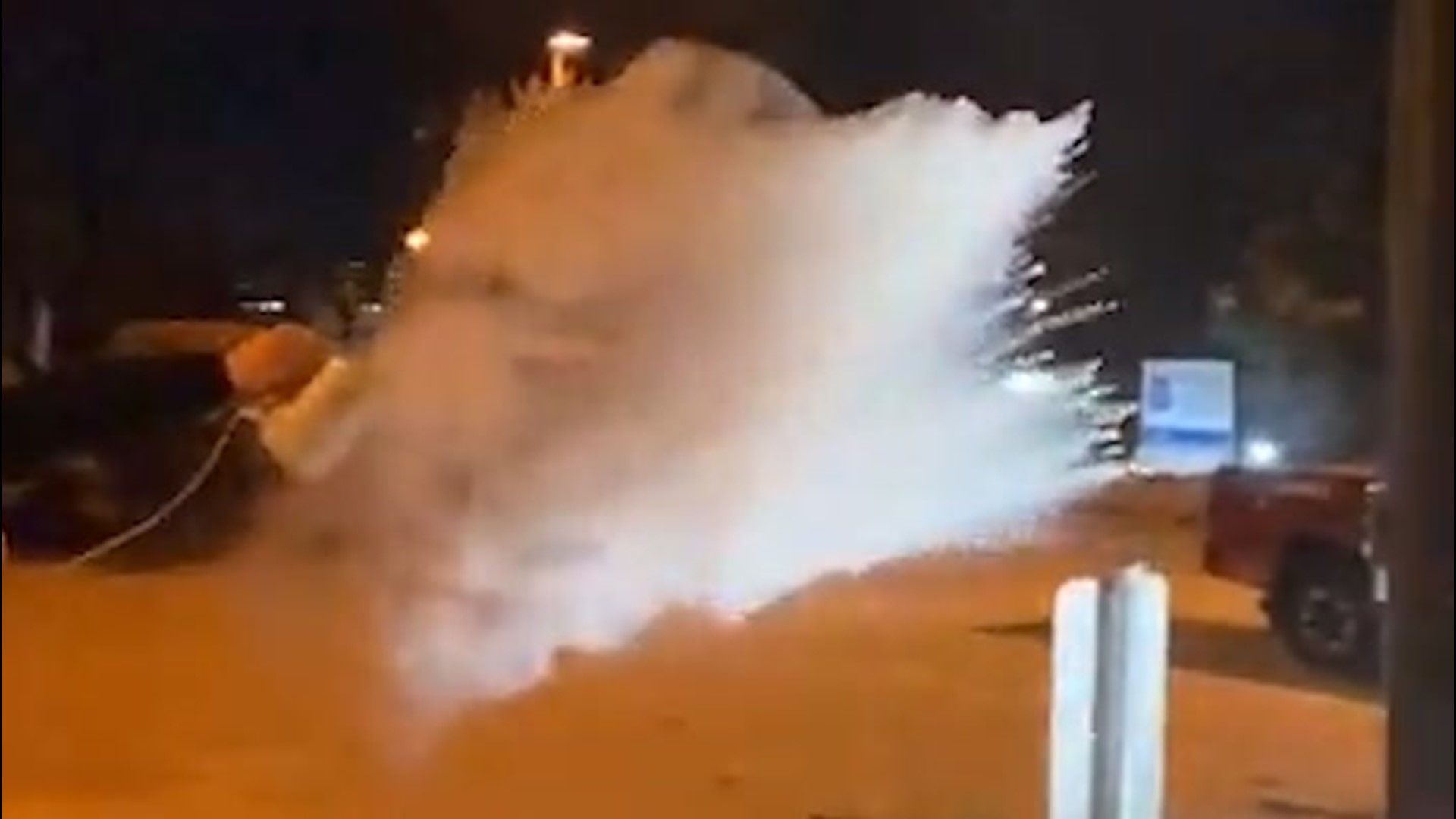 A National Weather Service worker demonstrates how boiling water can turn into a cloud when temperatures drop well below zero.