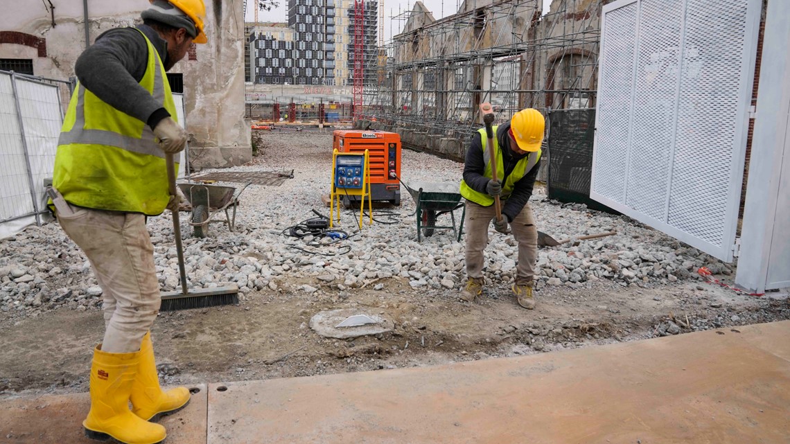 2026 Olympics under construction, but little progress 3 years before games