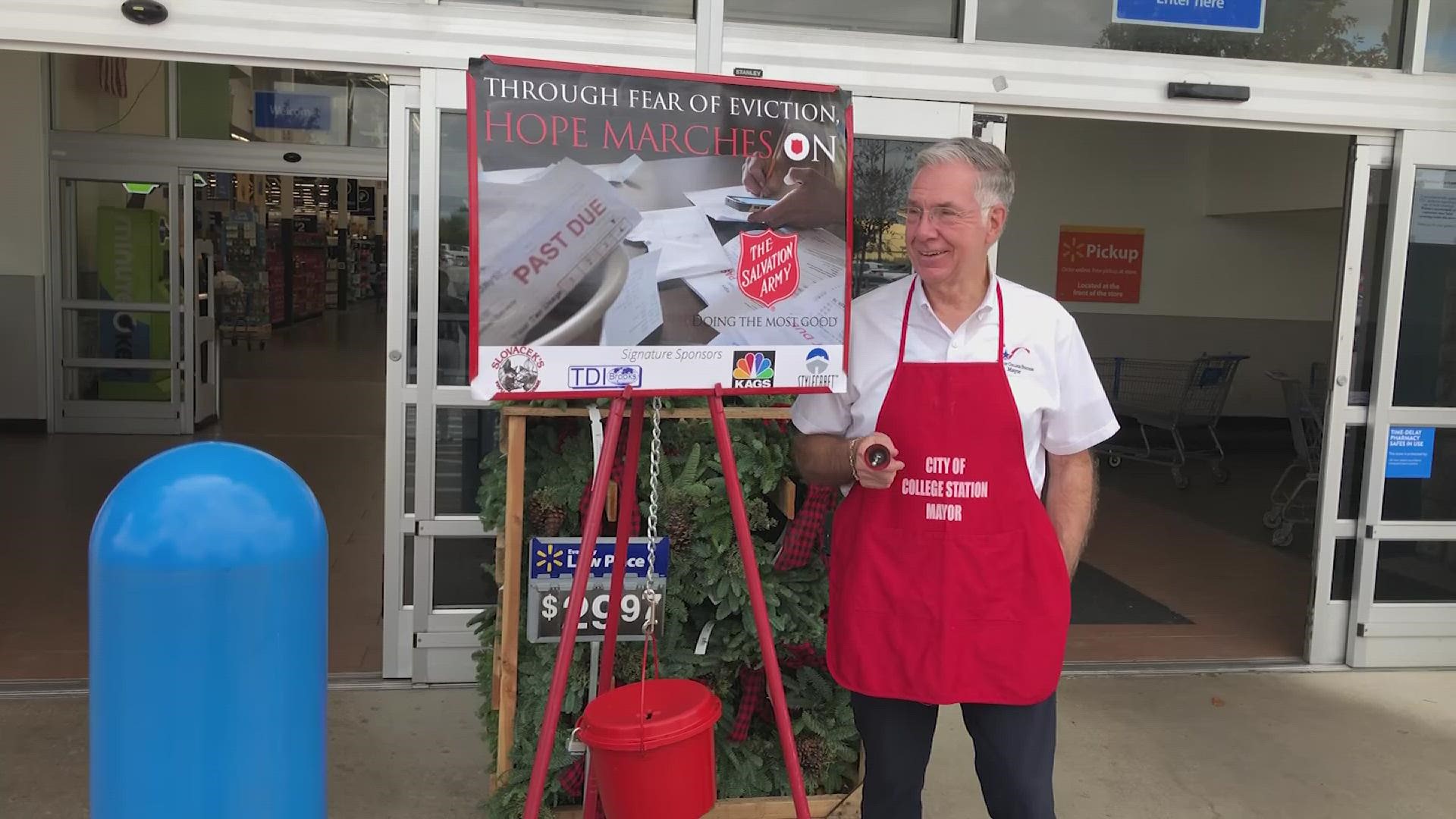Bryan Mayor Andrew Nelson and College Station Mayor Karl Mooney rang bells at two Salvation Army Red Kettles, to see what city could bring in the most donations.
