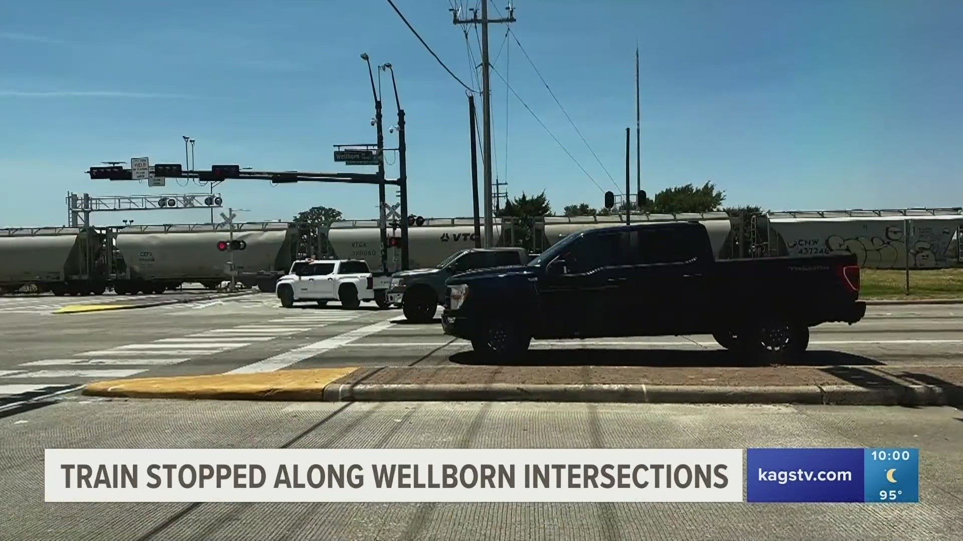 After delays that caused drivers delays since noon, the train that was previously stopped has now moved and the roadway has reopened.