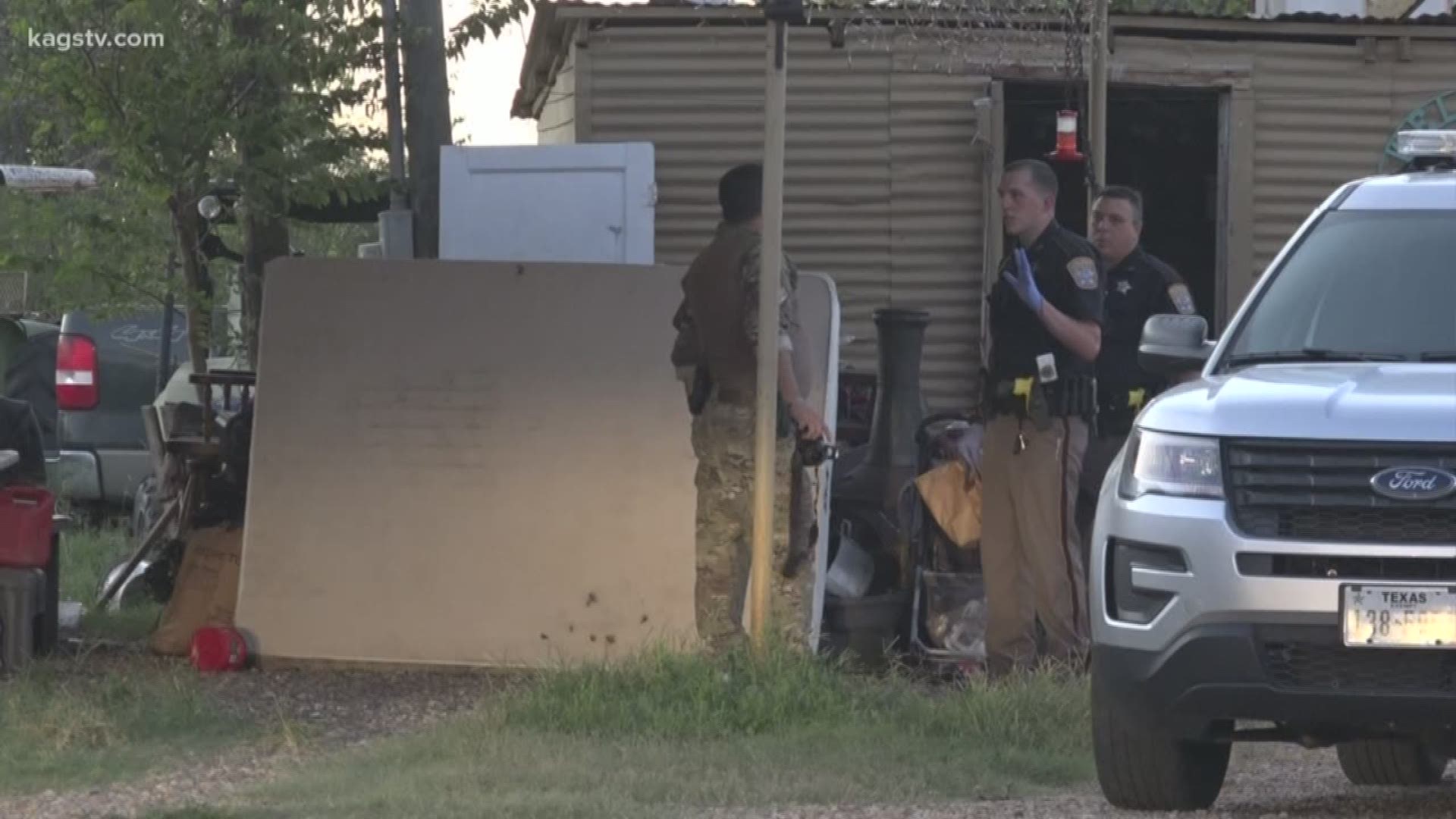 The armed man refused to come out of his house, but the standoff ended peacefully.