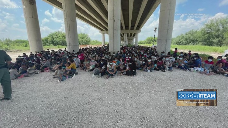 'There's too many people coming in' | Border Patrol processing migrants in unsheltered area under bridge as influx continues