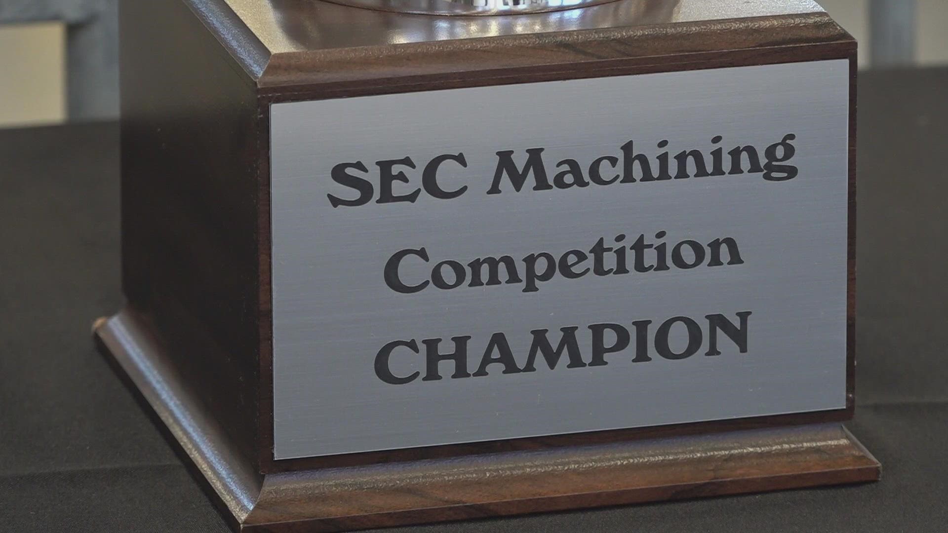 Teams from four SEC schools took part in a new CNC machining competition to create parts of the SEC logo out of metal and other materials.