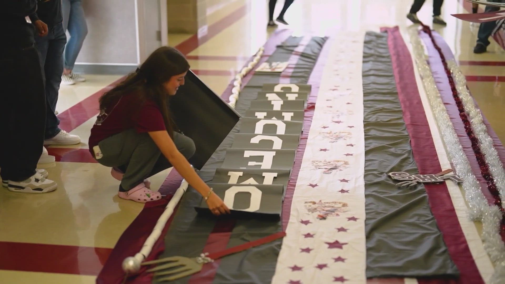 Lewisville High School is creating a mum that, when complete, will be 300 sq. feet. The base alone is 8 ft. wide.